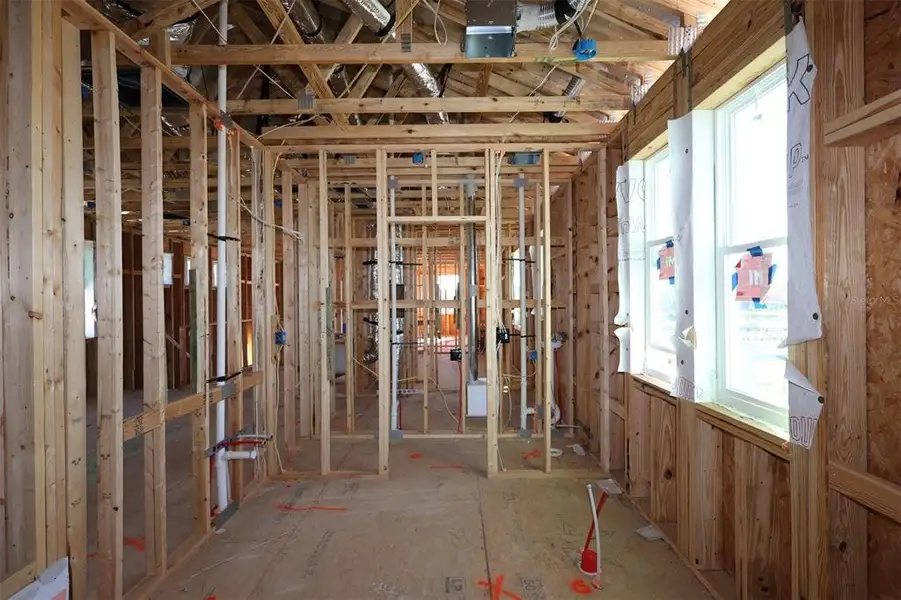 In-progress construction of a new home in Center Lake on the Park, St. Cloud, FL (Image 10).