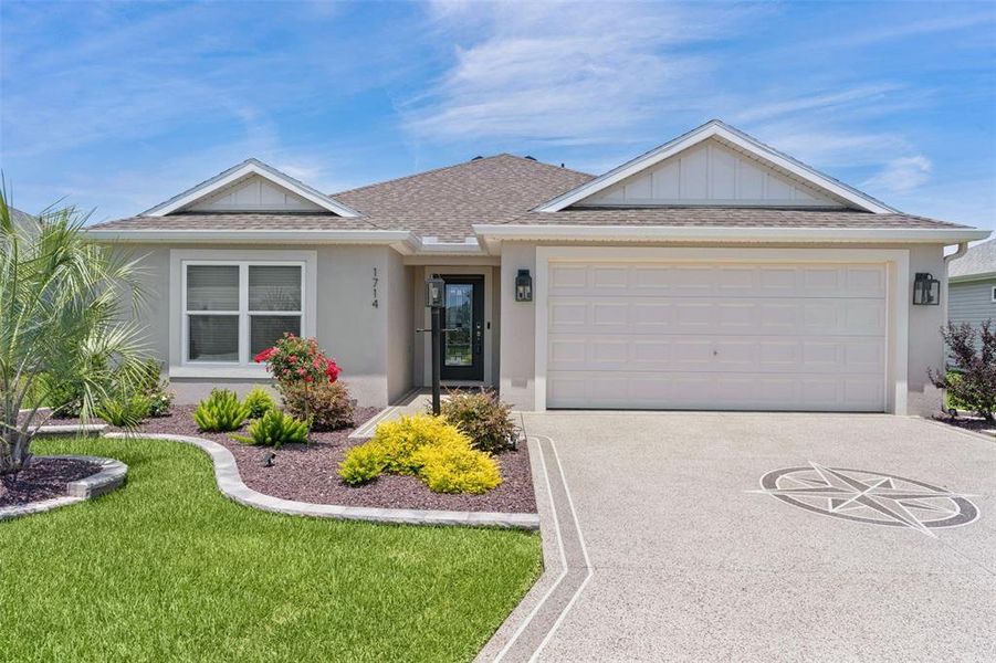 Front exterior of a new home in , The Villages, FL, highlighting curb appeal (Image 24).
