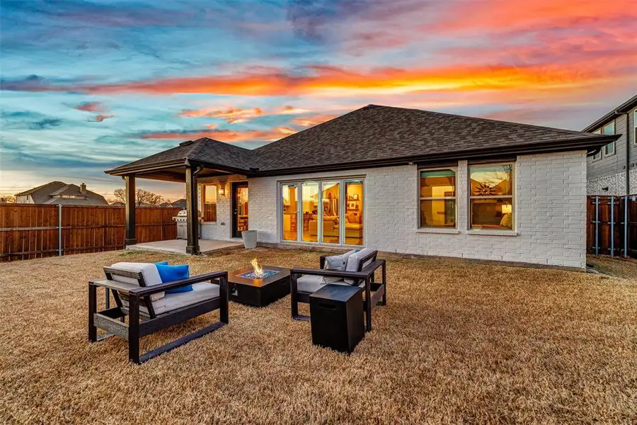 Exterior details and patio area of a home in Woodstone, Providence Village (Image 3). Exterior details and patio area of a home in Woodstone, Providence Village (Image 3).