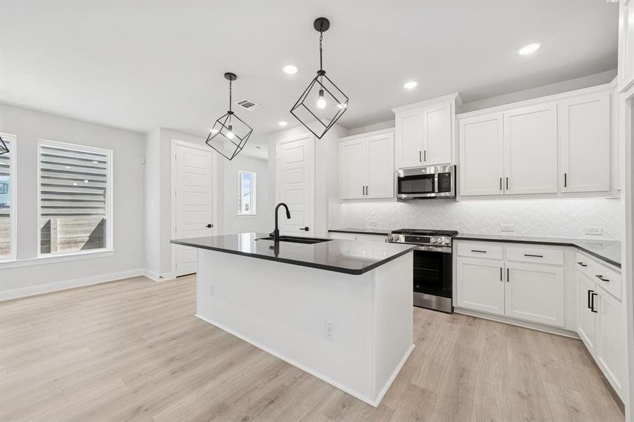 Furnished interior view inside a new home in Painted Tree Woodland West – Cottages, McKinney (Image 11). Furnished interior view inside a new home in Painted Tree Woodland West – Cottages, McKinney (Image 11).