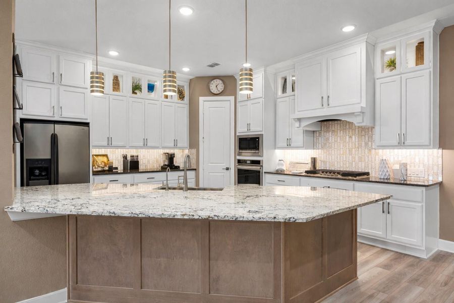 Upgraded Kent Moore Cabinets throughout with glass inserts