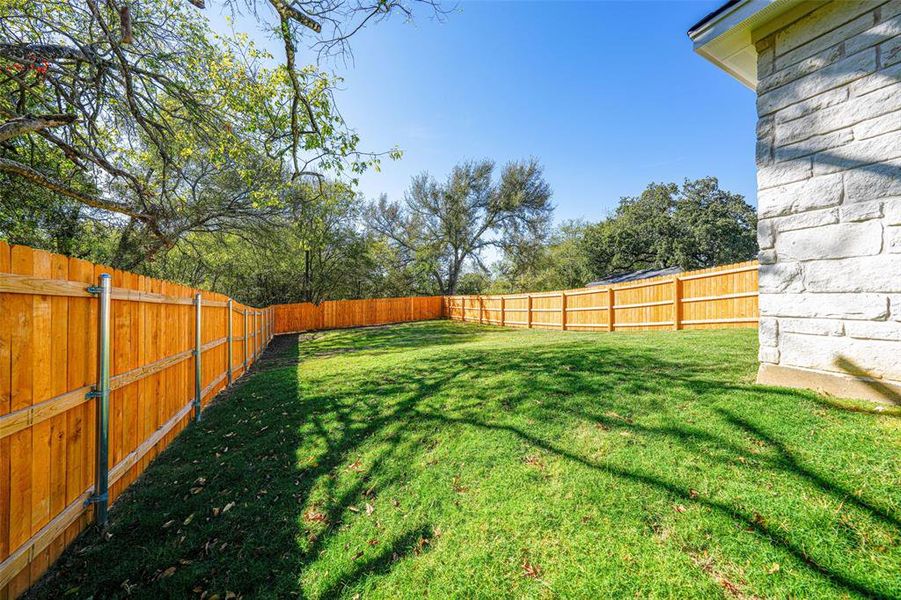 Huge Backyard with 6' privacy fence and wooded area Huge Backyard with 6' privacy fence and wooded area