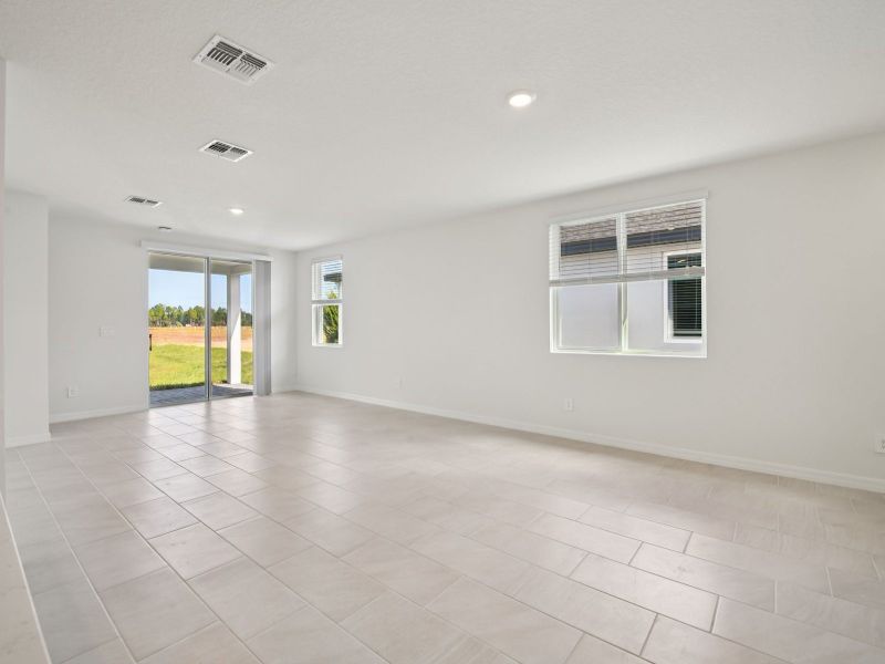 Spacious, unfurnished interior of a new home in Ridgehaven - Villas, Ormond Beach (Image 5).