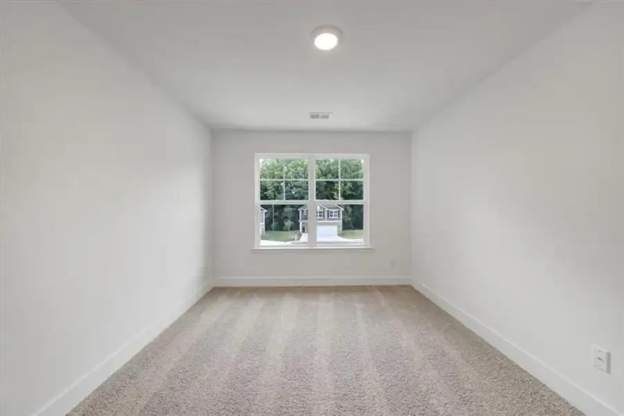 Spacious, unfurnished interior of a new home in Canterbury Villas, Carrollton (Image 25).