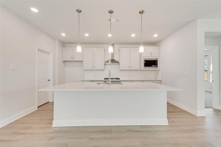 Furnished interior view inside a new home in Villages of Hurricane Creek, Anna (Image 8). Furnished interior view inside a new home in Villages of Hurricane Creek, Anna (Image 8).