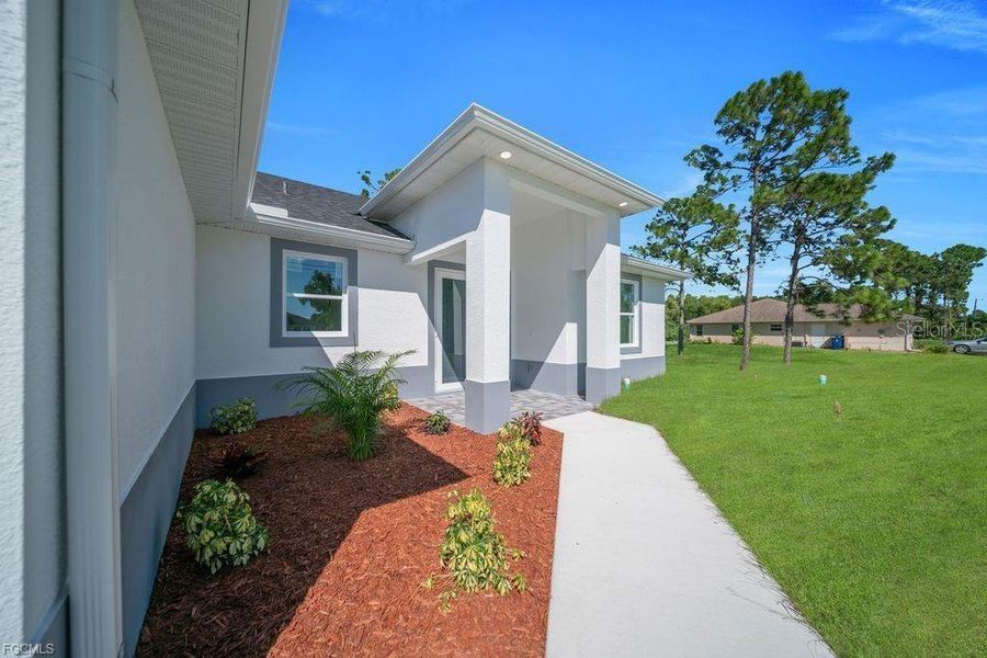 Exterior details and patio area of a home in , Lehigh Acres (Image 18).