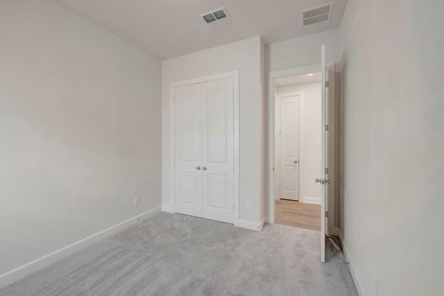 Spacious, unfurnished interior of a new home in Brookewater 55’ Homesites, Rosenberg (Image 20).