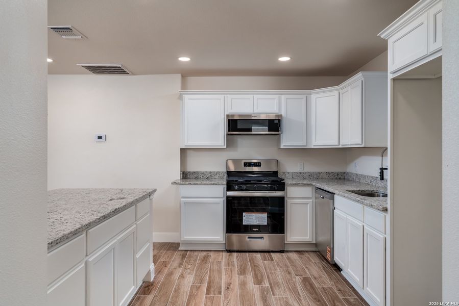 Furnished interior view inside a new home in , San Antonio (Image 8).