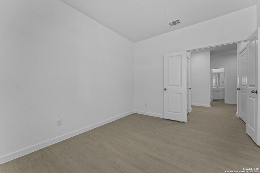 Spacious, unfurnished interior of a new home in Waterwheel: Coastline Collection, San Antonio (Image 20).