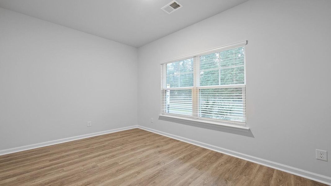 Spacious, unfurnished interior of a new home in Garbon Fields, Summerville (Image 27).