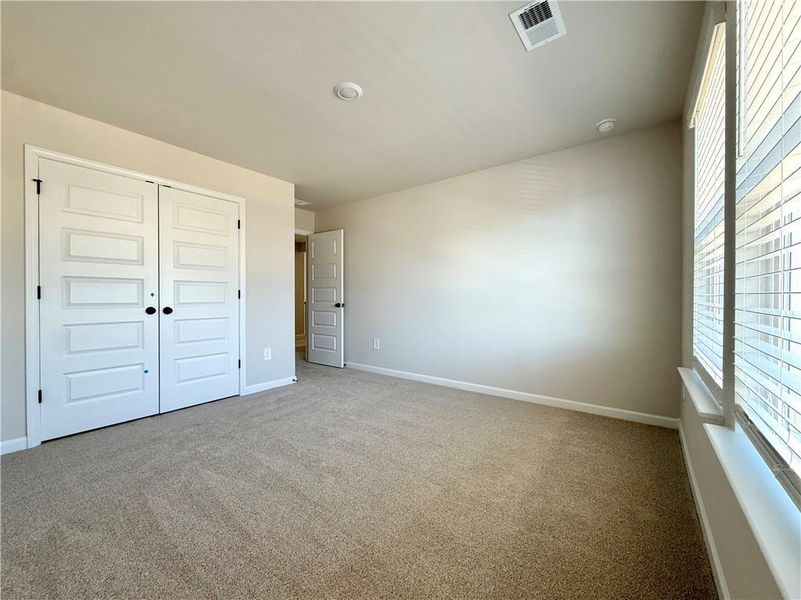 Spacious, unfurnished interior of a new home in Vines at Mill Creek - Estate Series, Braselton (Image 19).