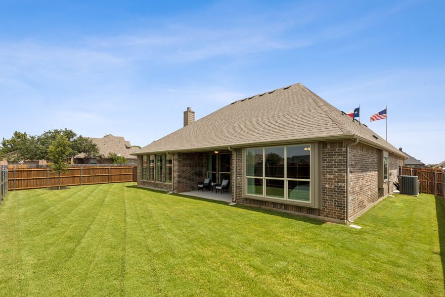 Exterior details and patio area of a home in Belle Meadows, Cleburne (Image 20).