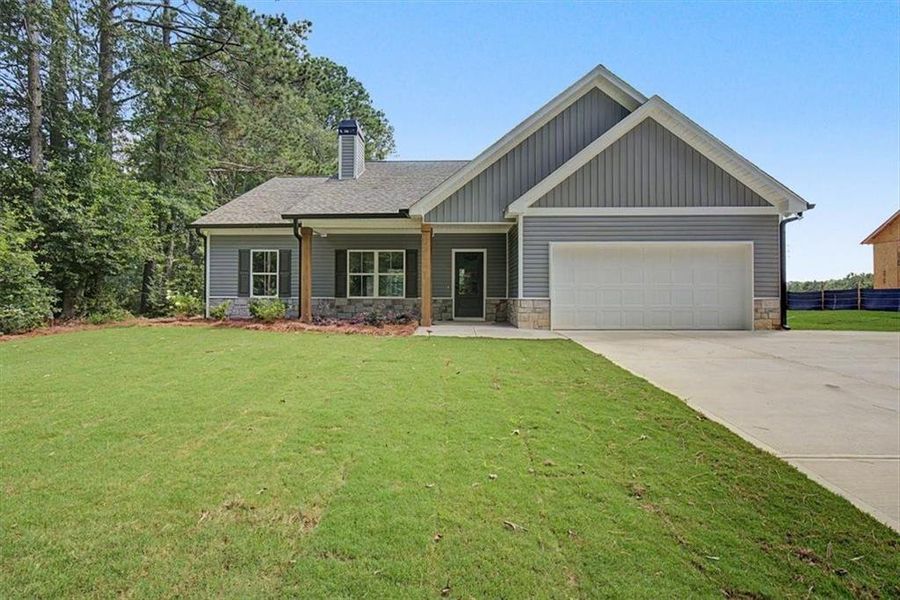 Front exterior of a new home in , Dallas, GA, highlighting curb appeal (Image 1). Front exterior of a new home in , Dallas, GA, highlighting curb appeal (Image 1).