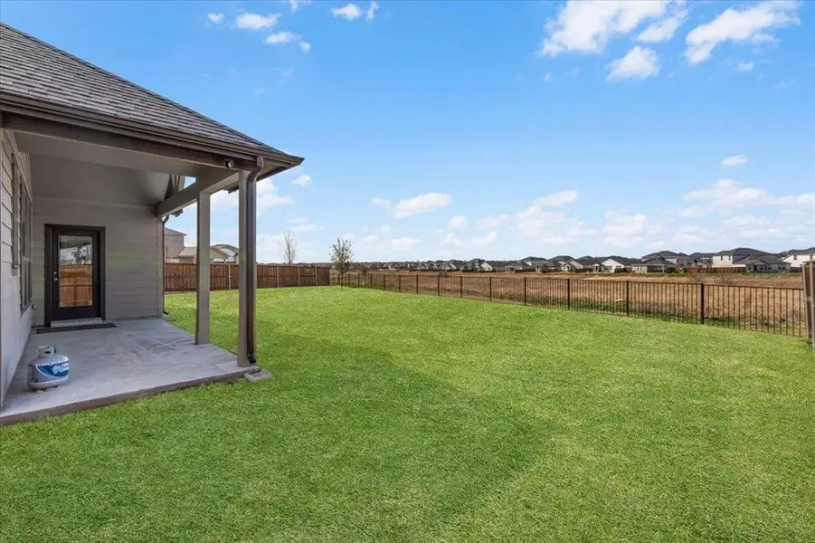 Exterior details and patio area of a home in , Fort Worth (Image 25).