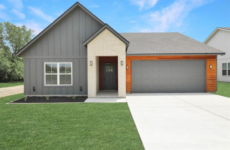 Front exterior of a new home in , Farmersville, TX, highlighting curb appeal (Image 1). Front exterior of a new home in , Farmersville, TX, highlighting curb appeal (Image 1).