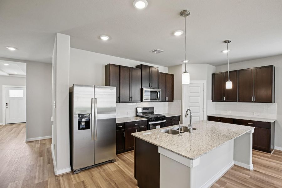 Photo is not of the actual home but is an inspirational photo of builder’s model home and may depict options, furnishings, and/or decorator features that are not included.