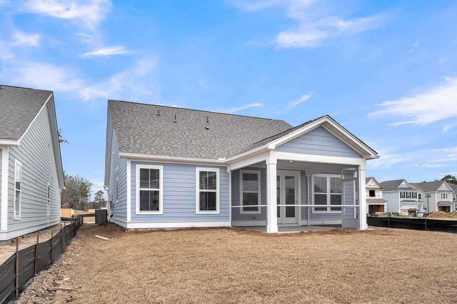 Exterior details and patio area of a home in High Point at Foxbank, Moncks Corner (Image 24).