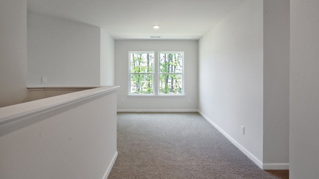 Spacious, unfurnished interior of a new home in Copper Run South, Durham (Image 17).
