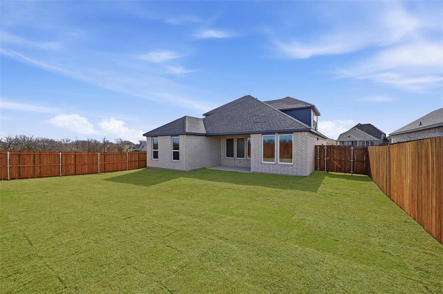 Exterior details and patio area of a home in The Preserve, Sherman (Image 3).