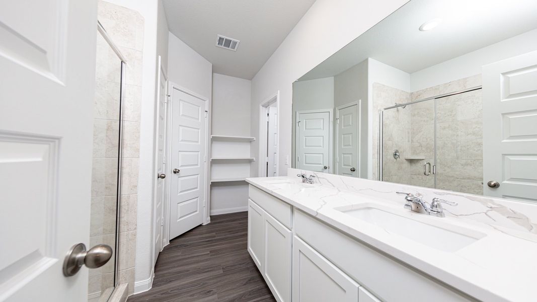 Representative furnished interior of a home built from the The Bronte - Walden on Lake Conroe by Legend Homes in Lake Conroe Area Homes, Montgomery (Image 8).