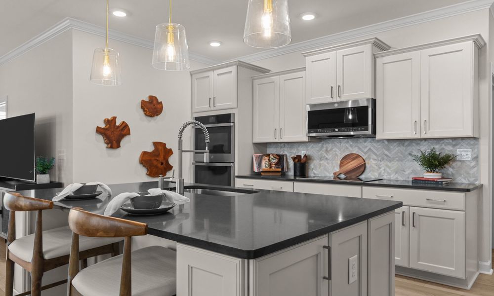 Representative furnished interior of a home built from the The Hibiscus by Chesapeake Homes in Traditions at Carolina Forest, Myrtle Beach (Image 12).