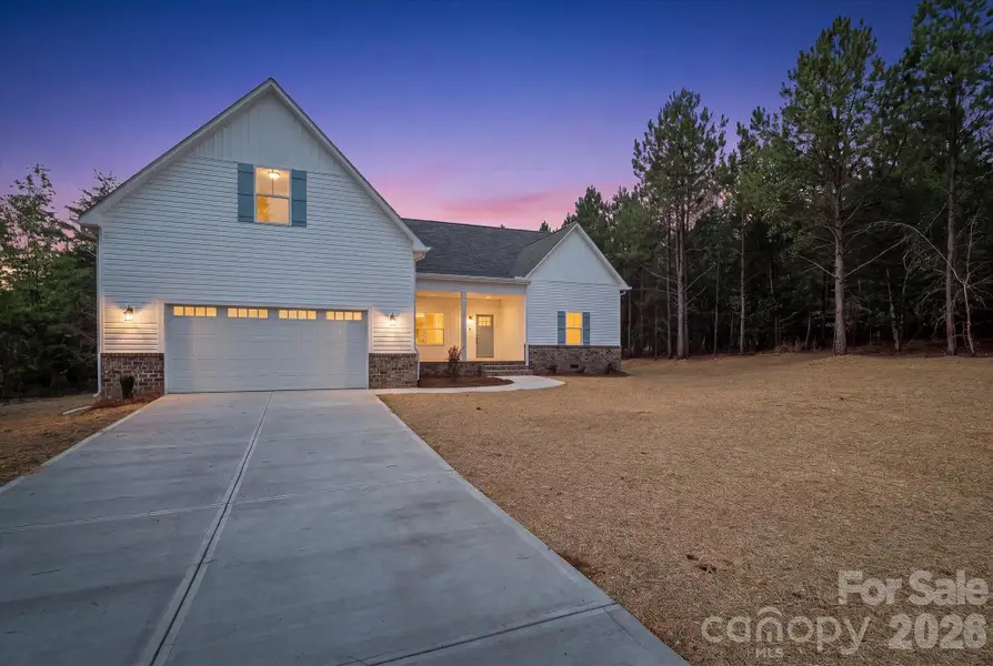 Exterior details and patio area of a home in , Troutman (Image 4).