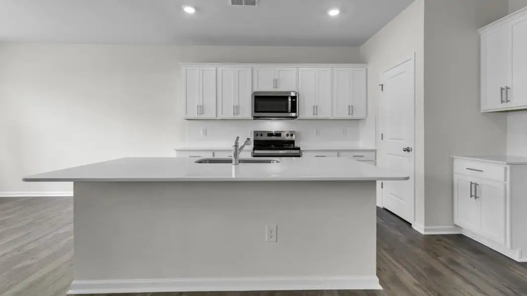 Furnished interior view inside a new home in Villa Grande, Winterville (Image 5).