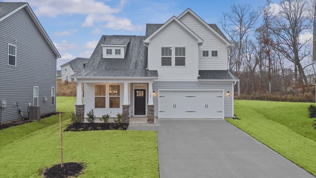 Representative exterior photo of a completed home built from the Finley by DRB Homes in The Wilds at Cedar Mountain, Asheville, NC (Image 18).