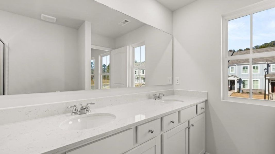 Furnished interior view inside a new home in Waypoint, Flowery Branch (Image 8).