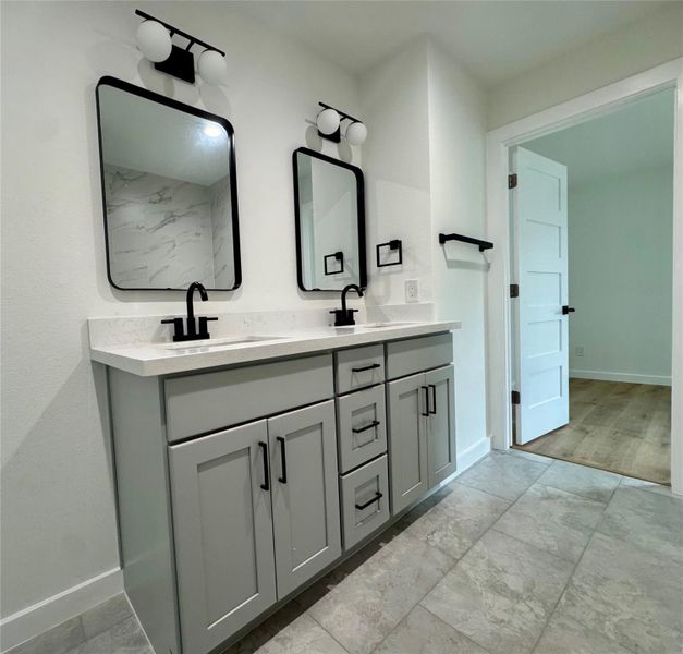 Jack and Jill bathroom with 2 sinks and plenty of storage space. Jack and Jill bathroom with 2 sinks and plenty of storage space.