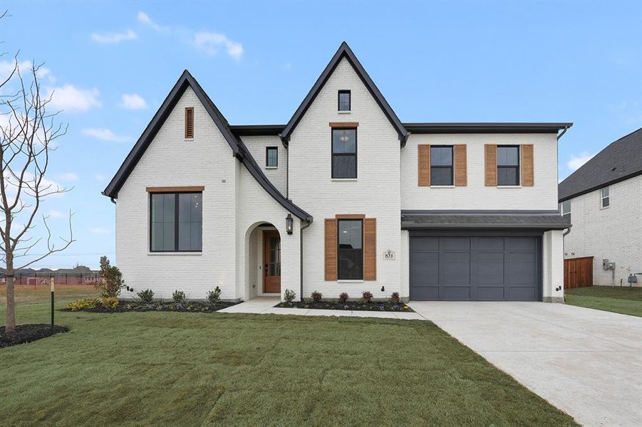 Front exterior of a new home in , Prosper, TX, highlighting curb appeal (Image 2). Front exterior of a new home in , Prosper, TX, highlighting curb appeal (Image 2).