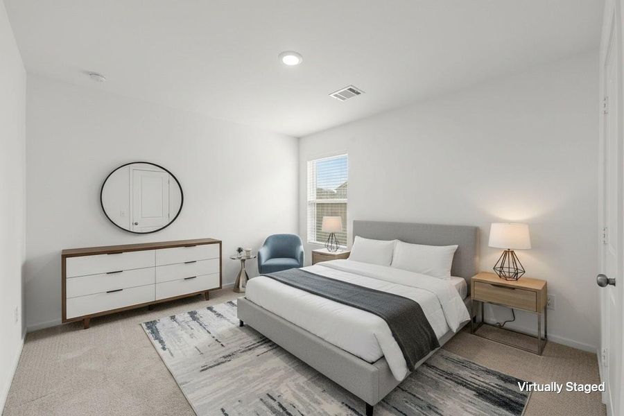 Virtually staged to showcase the bedroom’s comfortable proportions, neutral carpeting, recessed lighting, and natural light from the window. Virtually staged to showcase the bedroom’s comfortable proportions, neutral carpeting, recessed lighting, and natural light from the window.