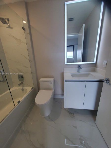 Updated mirrors and shower  glass doors