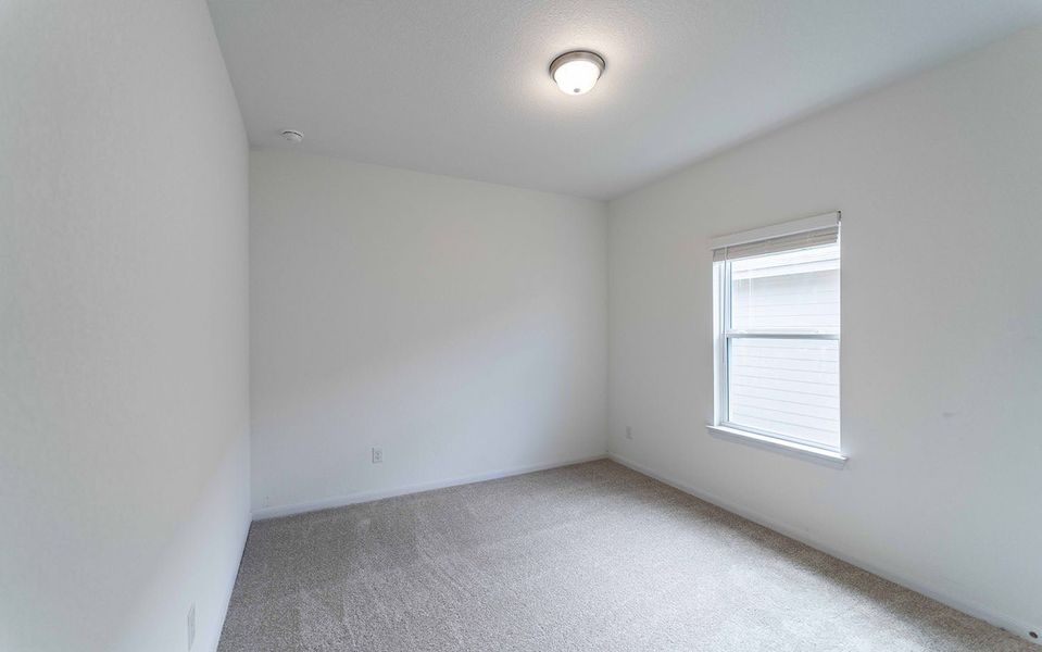 Spacious, unfurnished interior of a new home in Hunter's Ranch, San Antonio (Image 38).