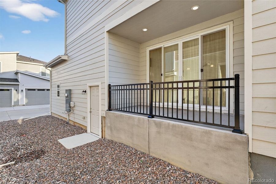 Exterior details and patio area of a home in , Aurora (Image 1).