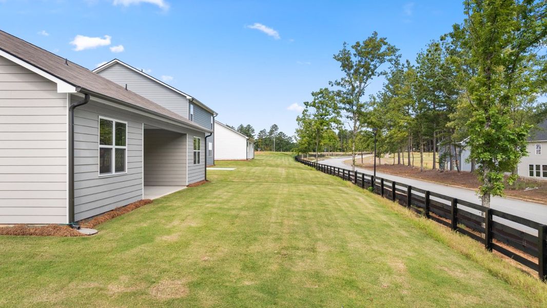 Representative exterior details of a home built from the Denton by D.R. Horton in Fairway 17 at Mirror Lake, Villa Rica (Image 26). Representative exterior details of a home built from the Denton by D.R. Horton in Fairway 17 at Mirror Lake, Villa Rica (Image 26).