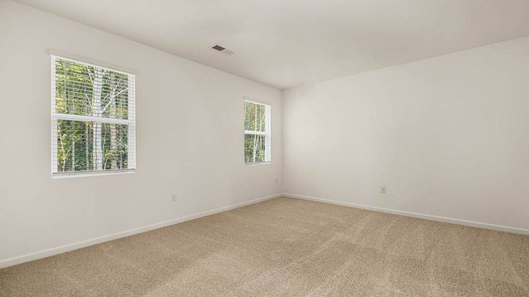 Representative unfurnished interior of a home built from the Dennis by D.R. Horton in Glenmaye, Hampton (Image 16).