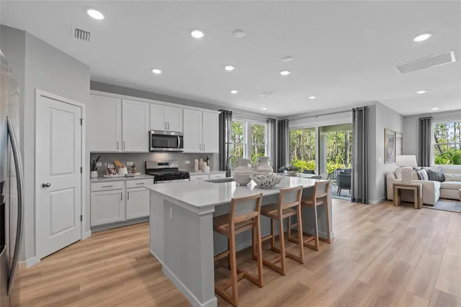 Furnished interior view inside a new home in The Magnolia Series at Reserve East, Flagler Beach (Image 8).