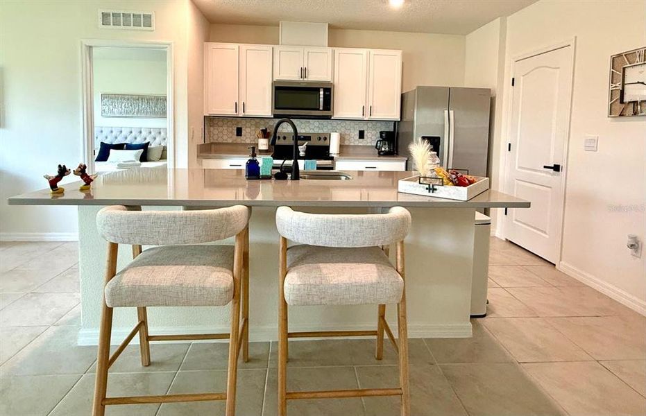 Furnished interior view inside a new home in Edgemont at Serenoa, Clermont (Image 8). Furnished interior view inside a new home in Edgemont at Serenoa, Clermont (Image 8).