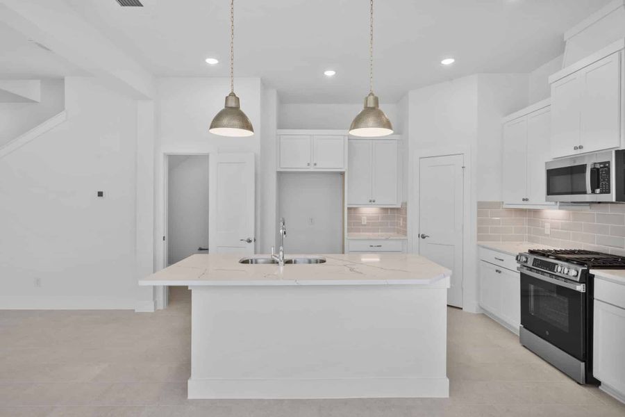 Furnished interior view inside a new home in Bridgeland, Cypress (Image 9).