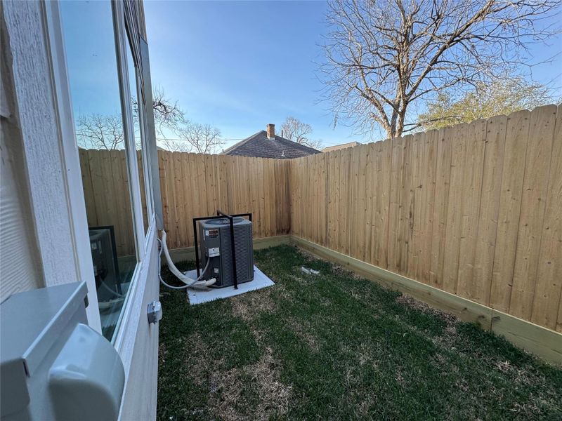 Exterior details and patio area of a home in , Houston (Image 2). Exterior details and patio area of a home in , Houston (Image 2).