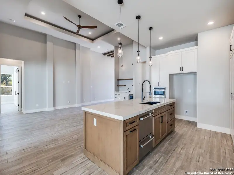 Furnished interior view inside a new home in , San Antonio (Image 9).