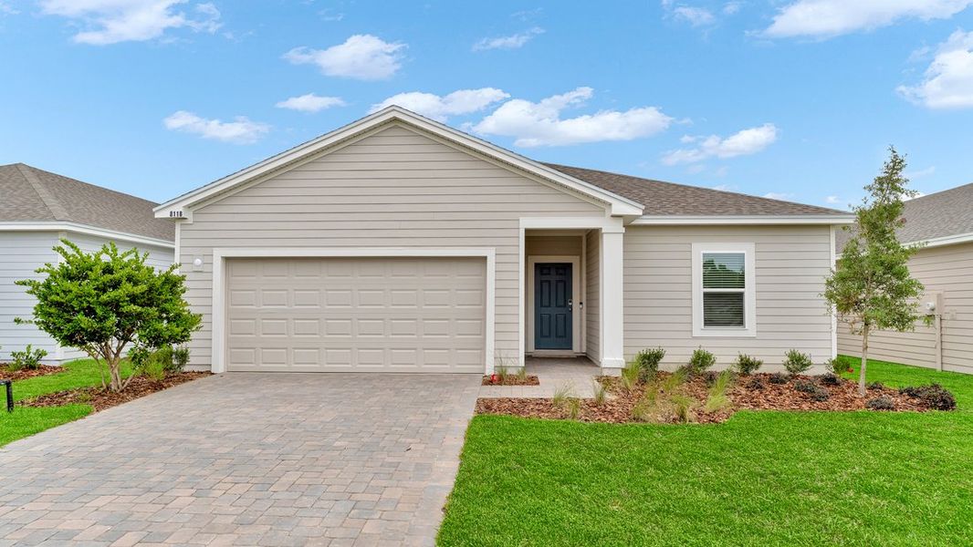 Representative exterior photo of a completed home built from the Sage by Taylor Morrison in Coopers Meadow, Jacksonville, FL (Image 1).
