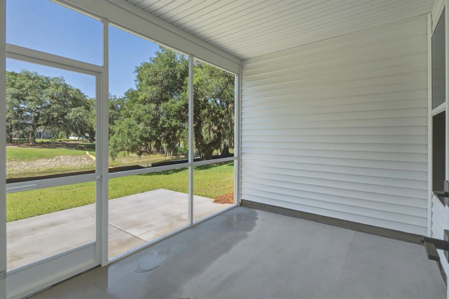 Exterior details and patio area of a home in The Oaks, Goose Creek (Image 2).
