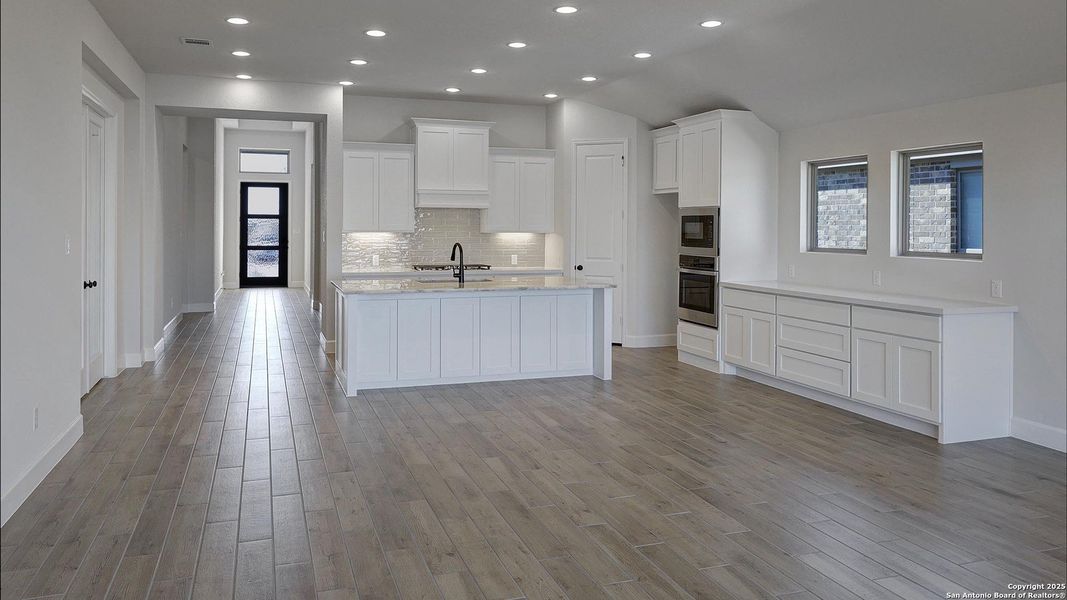 Furnished interior view inside a new home in Ladera 50', San Antonio (Image 9).