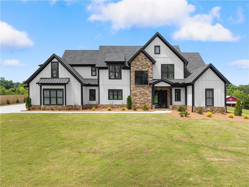 Front exterior of a new home in , Cumming, GA, highlighting curb appeal (Image 27). Front exterior of a new home in , Cumming, GA, highlighting curb appeal (Image 27).