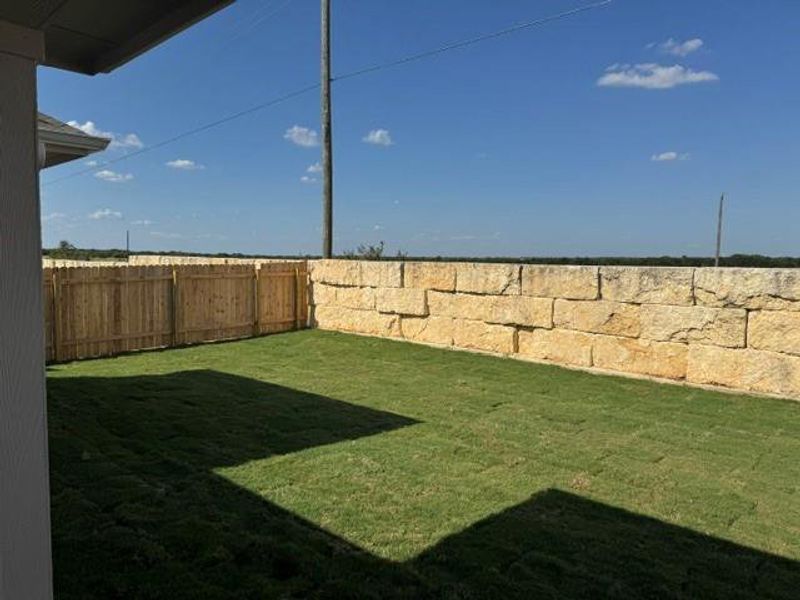 Exterior details and patio area of a home in Hunters Glen, Jarrell (Image 14). Exterior details and patio area of a home in Hunters Glen, Jarrell (Image 14).