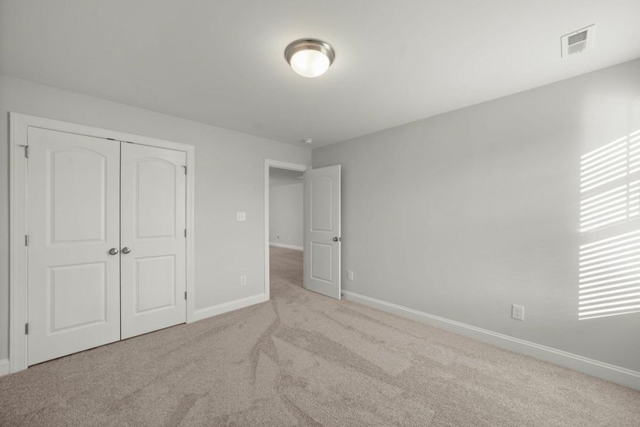 Spacious, unfurnished interior of a new home in Cottages at Piper Village, Trinity (Image 34).