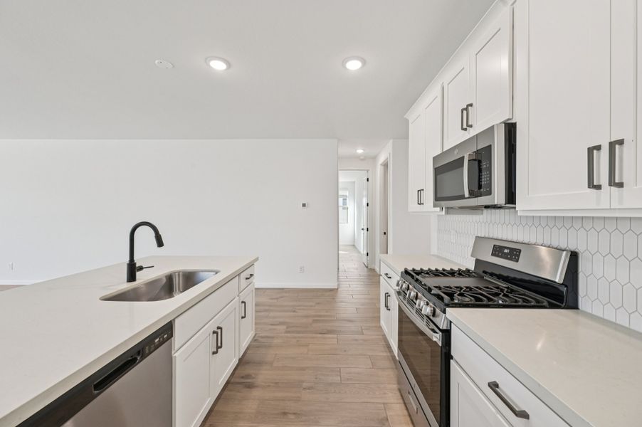 Kitchen featuring the Harmony Collection. Finishes and options may vary by community.