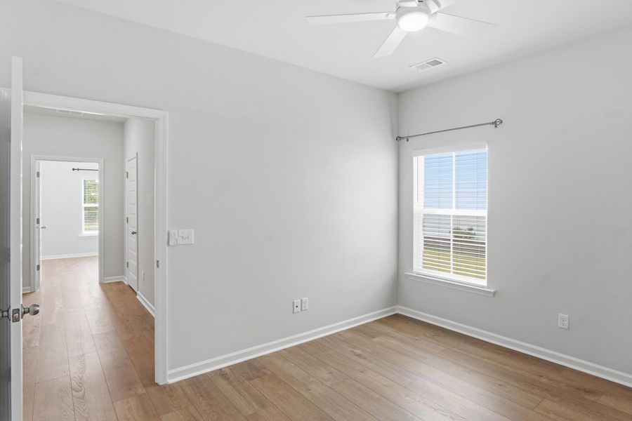 Spacious, unfurnished interior of a new home in Horizons at Summers Corner | 55+, Summerville (Image 28).